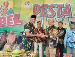 Babinsa Hadiri Hari Jadi Ke-108, Nagori Karang Sari, Penuh Kebersamaan