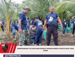 Kebersamaan TNI Dan Masyarakat Warnai Bersih Pantai Desa Tana Duen