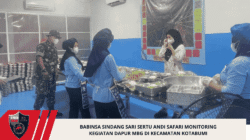 Babinsa Sindang Sari Sertu Andi Safari Monitoring Kegiatan Dapur MBG di Kecamatan Kotabumi