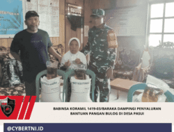 Babinsa Koramil 1419-03/Baraka Dampingi Penyaluran Bantuan Pangan Bulog di Desa Pasui