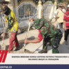 Babinsa Bersama Warga Gotong Royong Pengocoran Lantai Halaman Masjid Al Muhajirin