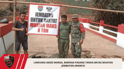 Lindungi Akses Warga, Babinsa Pasang Tanda Batas Muatan Jembatan Aramco